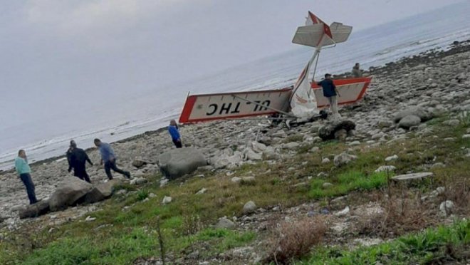 Son dəqiqə: Xəzər sahilində təyyarə yerə çırpıldı - Foto